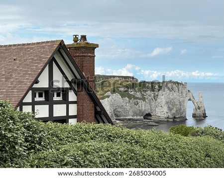 Coastal cottage with the view to the dramatic cliffs and the Atlantic Ocean, Étretat, Normandy, France, July 2024