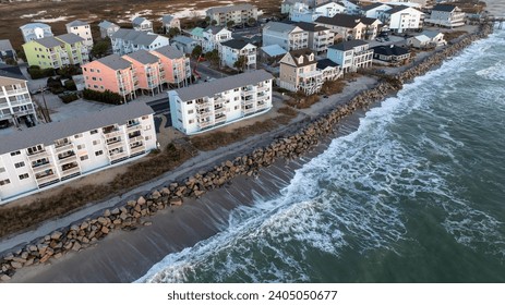 Coastal homes in Carolina Beach, NC face the Atlantic, highlighting the risks of climate change and the importance of flood insurance. - Powered by Shutterstock