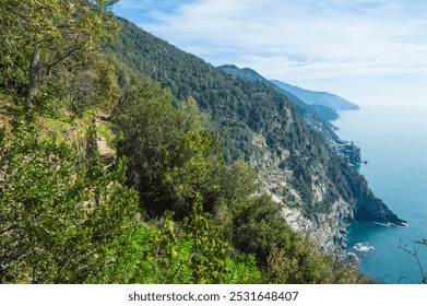 Coastal Path, Cinque Terre's Scenic Cliffside Walk. Sunlit Path Overlooking the Mediterranean Sea, Cinque Terre. Cliff View, February.  - Powered by Shutterstock