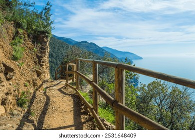 Coastal Path, Cinque Terre's Scenic Cliffside Walk. Sunlit Path Overlooking the Mediterranean Sea, Cinque Terre. Cliff View, February.  - Powered by Shutterstock