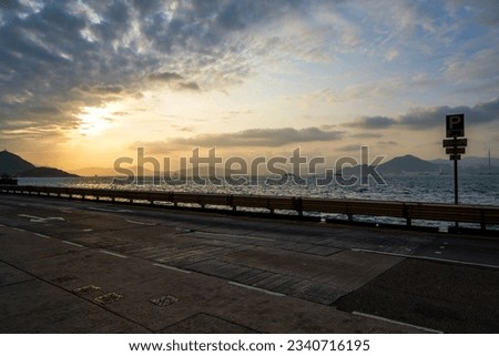 Coastal road and vehicles in Kennedy Town, Hong Kong