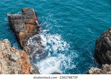 Coastal rocks and shore water, aerial view. Dongbaek Park of Busan city, South Korea - Shutterstock ID 2282788739