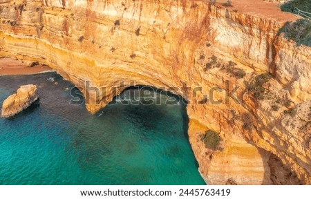 Coastal rocky seascape, view of Praia da Marinha beach in Algarve region in Atlantic ocean, Portugal, Europe