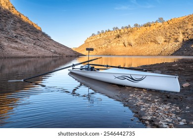 coastal sculling shell in sandstone canyon of Horsetooth Reservoir in Colorado in fall scenery - Powered by Shutterstock