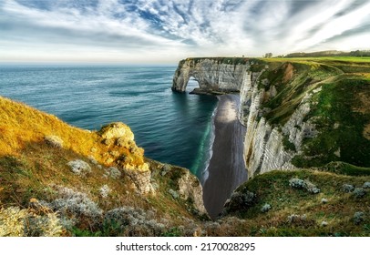 Coastal sea cliffs. Cliff by the sea. Cliff at the sea beach. Sea beach at cliffs