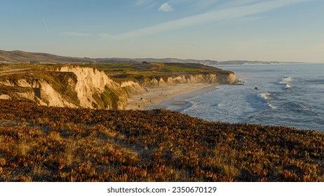 The coastal view in Half Moon Bay under blue sky. - Shutterstock ID 2350670129
