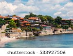 Coastal view of Nesebar city houses and embankment. Nesebar Bulgaria. Ancient town on the Black Sea coast