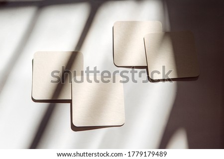 coasters under the sun with shadows