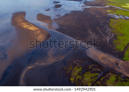 Similar – Image, Stock Photo Troll rock in Iceland stands in the sea