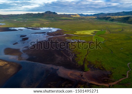 Similar – Image, Stock Photo Troll rock in Iceland stands in the sea