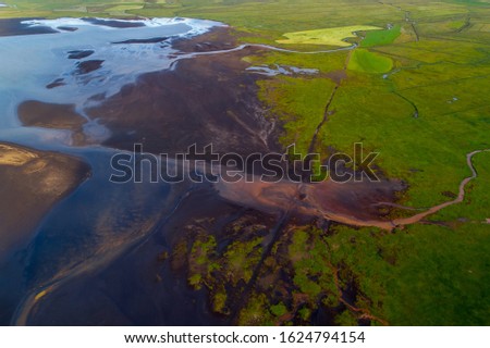 Similar – Image, Stock Photo Troll rock in Iceland stands in the sea