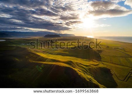 Similar – Image, Stock Photo Troll rock in Iceland stands in the sea