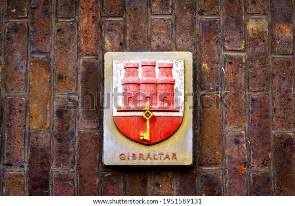 Coat of arms of Gibraltar, granted in 1502 by Isabella of Castile, featuring a red castle under which a golden key hangs