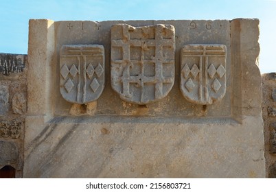 Coat Of Arms Of The Order Of Knights Of The Hospital Or Hospitallers On The Wall Of Bodrum Castle Or Bodrum Fortress Or Castle Of St. Peter Or Petronium, Turkey.