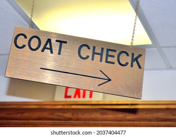 Coat Check Sign Displayed Indoors.