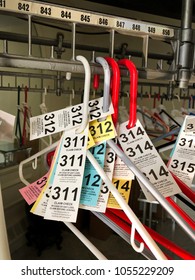 Coat Check Tags On A Hangers