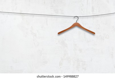 Coat Hanger On A White Wall