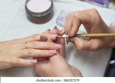 Coated Acrylic Nails In A Beauty Salon