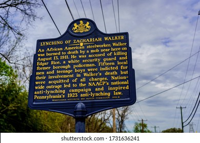 Coatesville, PA / USA - May 3, 2020: A Pennsylvania historic marker noting the Lynching of  Zachariah Walker, black steel worker who was dragged from a hospital and thrown in a raging steel mill fire.