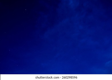 A cobalt blue sky studded with stars - Shutterstock ID 260298596