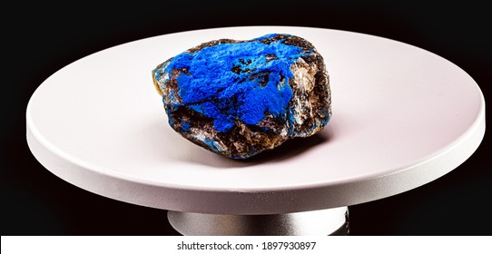 Cobalt on ore, blue pigment on rock. Used as a dye throughout the world industry. Ore on electronic scale - Shutterstock ID 1897930897