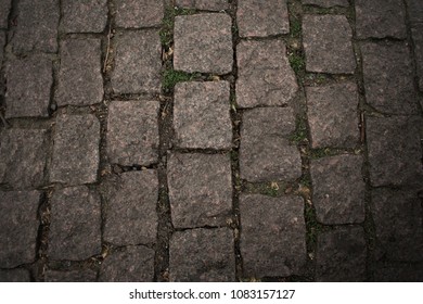 Cobble Stone Bricks Floor With Pattern And Dirt Medival Construction In Brown Color