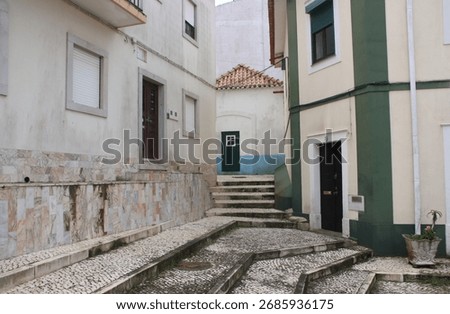 Cobbled laneway and steps in the old town of Nazare, Portugal.