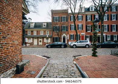 Cobblestone street and brick houses in Society Hill, Philadelphia, Pennsylvania.