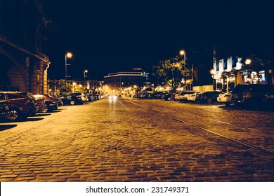 Cobblestone street in Fells Point at night, Baltimore, Maryland.