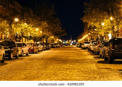 Cobblestone street at night, in Fells Point, Baltimore, Maryland.