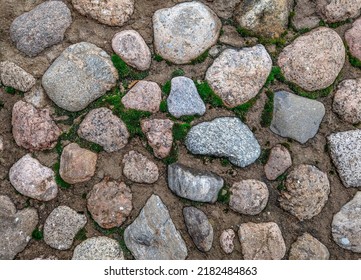 Cobblestone surface background top view. Cobblestone texture background. Cobblestone background. Cobblestones top view