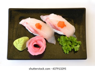 Cobia Sushi On Black Plate