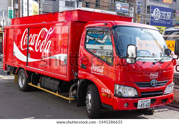 Coca Cola truck soft drink Coke brand logistic\
deliver products to stores and restaurants in Osaka, Japan. 16\
January 2019.