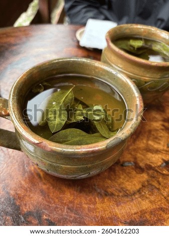 Coca leaf tea to help with the altitude in Ollantaytambo, Peru