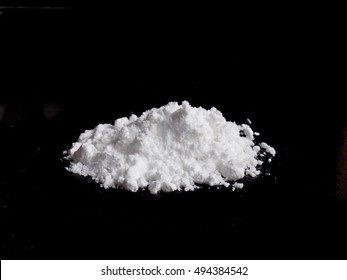 Cocaine Drug Powder Pile On Black Background