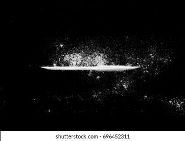 Cocaine line isolated on black background 
