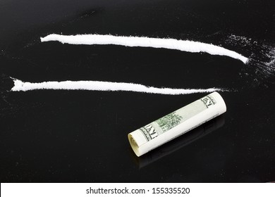 Cocaine Powder In Lines On A Black Background