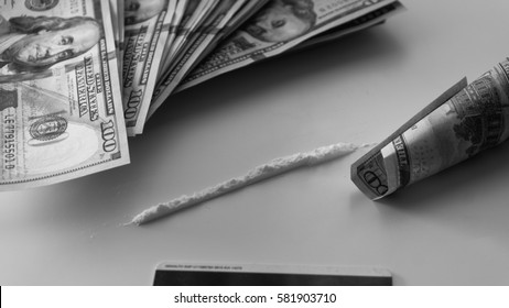 Cocaine Snorted Through Rolled 100 Dollar Banknote.  lifestyle of a drug addict