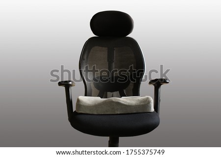Coccyx seat cushion in office chair