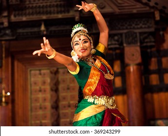 COCHIN, INDIA - JANUARY 21: Beautiful Indian girl dancing classical traditional Indian dance Bharat Natyam on January 21, 2016 in Kerala Kathakali Center in Fort Cochin, South India.