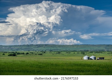 Cochrane Alberta Canada, July 07 2022: A Large Severe Thunderstorm With Lightning And Tornadoes Passing Through Rural Alberta Showering Golf Ball Sized Hail.