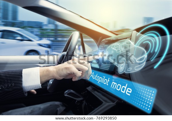 Cockpit of autonomous car. Driverless car.\
Self-driving vehicle. Head up\
display.