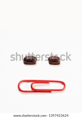 Similar – Image, Stock Photo Comparison of deposited brown eggs for offspring and droppings from a walking leaf