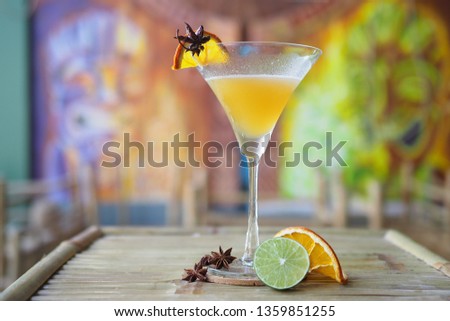 
Cocktail in a beautiful glass decorated with fruit