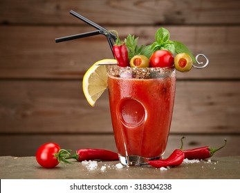 Cocktail bloody mary on wood