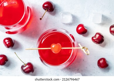 Cocktail With Cherry And Ice, An Aperitif With A Garnish And Fresh Berries, Overhead Flat Lay Shot