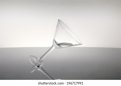 Cocktail Glass Tipping Over.