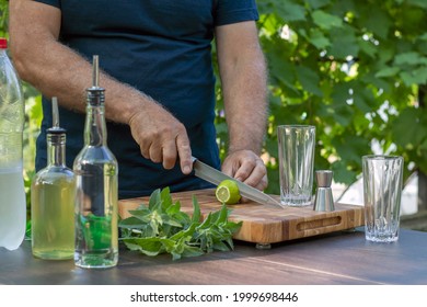  Cocktail At Home, Home Mixologist. Cocktail Recipe With Mint, Lime And Rum. Step By Step Cocktail Recipe.