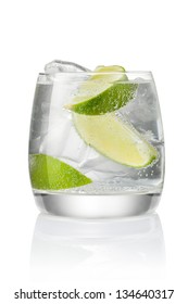 Cocktail with ice and lime slice isolated on white background