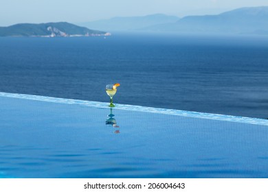 Cocktail In An Infinity Pool